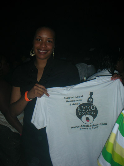 Young Lady getting a shirt at the Warehouse in Marriana