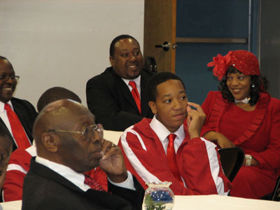 Mrs. James looks on as members of the Star program and mentors listen to community leaders